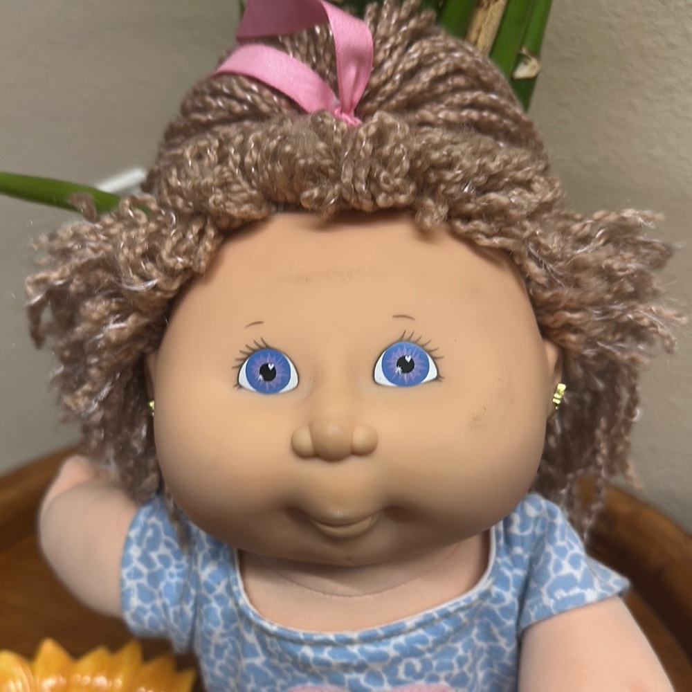 Girl cabbage patch with adorable earrings